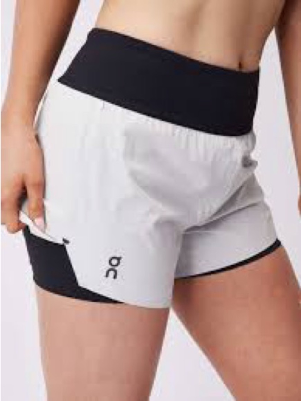 On Running shorts lightweight grey outer layer black inner liner Size  Medium